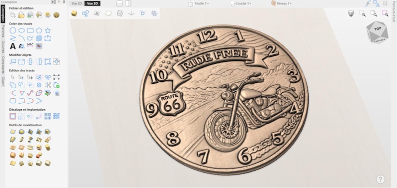 May include: A bronze-colored coin featuring a motorcycle and the text "RIDE FREE" above it. The coin also displays the text "ROUTE 66" and numbers around the edge, resembling a clock face. The design is detailed and three-dimensional.