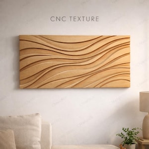 Peut inclure: Une œuvre d'art murale rectangulaire en bois avec un motif texturé CNC. L'œuvre présente une série de motifs ondulés et fluides sculptés dans le bois brun clair. Le texte "CNC TEXTURE" est au-dessus de l'œuvre.