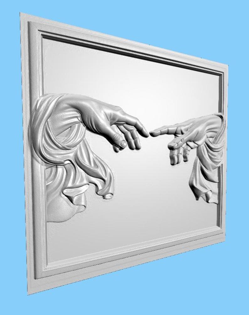 May include: A white relief sculpture depicting the iconic 'Creation of Adam' scene. Two hands, emerging from a rectangular frame, almost touch. The hands are detailed, with flowing drapery. The artwork is set against a light blue background.