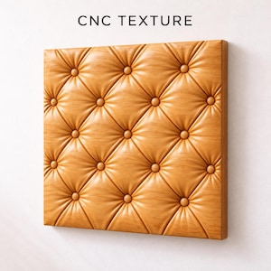 May include: A square wooden wall panel featuring a CNC texture with a tufted diamond pattern. The light brown wood surface displays a repeating design of recessed buttons and gathered folds, with the text CNC TEXTURE printed above the panel.