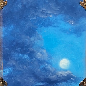 May include: An oil painting depicting a night sky with a full moon, framed by a decorative gold border. The sky transitions from deep blue to a lighter shade, with textured brushstrokes depicting clouds. The moon is a bright, white orb.