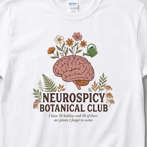 May include: White t-shirt with a graphic of a brain, flowers, and the text "NEUROSPICY BOTANICAL CLUB." The design includes a watering can and the phrase "I have 50 hobbies and 49 of these are plants I forgot to water."