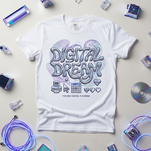 May include: White t-shirt with a "DIGITAL DREAM" graphic in a futuristic font, featuring pixelated icons and the text "Y2K NEO-DIGITAL FUTURISM." The design incorporates shades of blue, purple, and silver, evoking a retro-digital aesthetic.