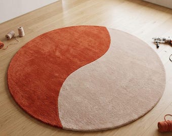 Alfombra abstracta Yin-Yang tejida a mano, alfombra circular minimalista color naranja quemado, alfombra de lana premium hecha a mano para dormitorio moderno.