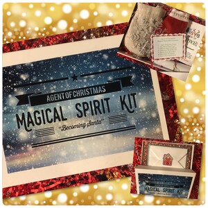 May include: A blue and white box with the text "Agent of Christmas Magical Spirit Kit" and "Becoming Santa" on it. The box is surrounded by red and gold glitter.