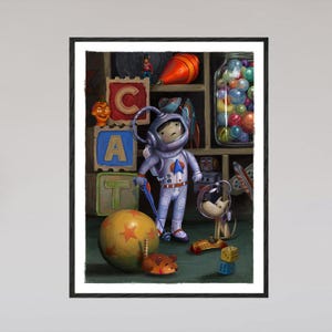 May include: A framed digital illustration featuring a child in a white astronaut suit standing among toys, including large blocks spelling CAT, a jar of colorful marbles, a yellow ball with orange stars, a small dog in a helmet, and a toy car.