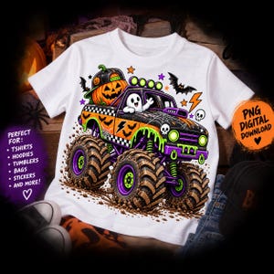 May include: A white t-shirt featuring a graphic of a monster truck with a pumpkin in the truck bed and a ghost in the driver seat. The truck is orange and black with green slime accents, spider webs, bats, and skulls. The design includes stars and lightning.