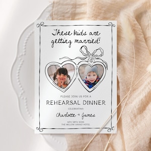 May include: A white invitation card with black handwritten text, including the phrase "These kids are getting married!" Two heart-shaped frames hold photos of children. The card is for a rehearsal dinner, celebrating Charlotte and James.