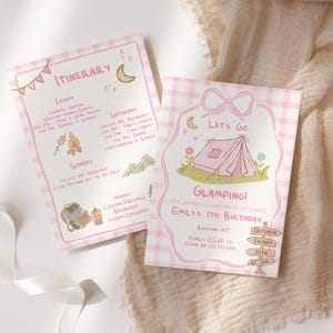 May include: Two pink and white gingham-patterned cards with camping-themed illustrations. One card reads "ITINERARY" with a schedule. The other card says "Let's Go Glamping!" and invites guests to a birthday party. The cards are on a white surface.