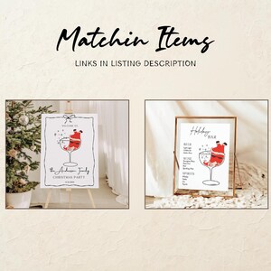 May include: Two framed Christmas party signs. One sign says "Welcome to the Anderson Family Christmas Party" with a Santa Claus in a wine glass graphic. The other sign is a "Holiday Bar" menu with a Santa Claus in a wine glass graphic.
