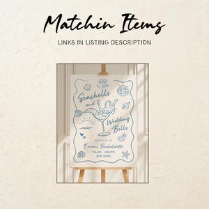 May include: A white sign on an easel with blue line art and text. The sign reads "Seashells and Wedding Bells" with illustrations of a mermaid in a cocktail glass, seashells, and other beach-themed icons. The text "Welcome to Emma's Bachelorette, Tulum, Mexico, Aug 202X" is also present.