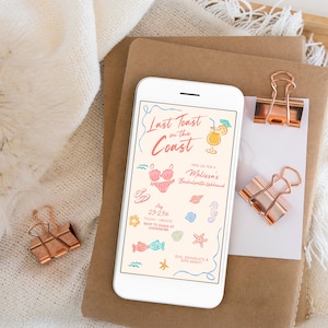May include: A smartphone displays a beach-themed invitation with the text "Last Toast on the Coast." The invitation features illustrations of a cocktail, bikini, seashells, and starfish. Copper paper clips and stationery are nearby.