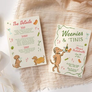 May include: Two cream-colored rectangular cards featuring colorful illustrations of dachshunds, hot dogs, and martini glasses. The text reads Weenies & 'Tinis, Olivia's Bachelorette, June 24 at 4pm, and The Details with a schedule for Friday, Saturday, and Sunday.