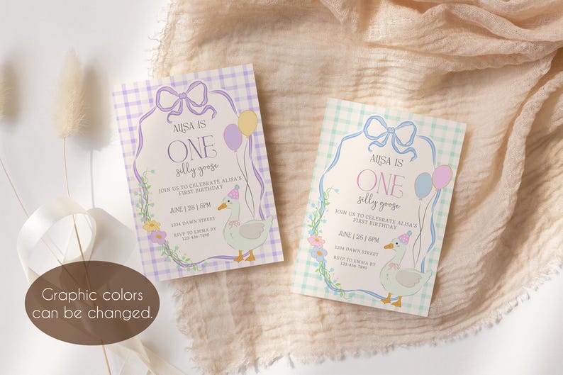 May include: Two printable invitations for a first birthday party. The invitations feature a light blue and white gingham pattern with a purple bow and a yellow and pink balloon. The text on the invitations reads "Aisa is One silly goose".