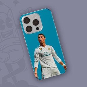 May include: A blue iPhone case featuring a photo of a footballer wearing a white jersey with the text "Fly Emirates".