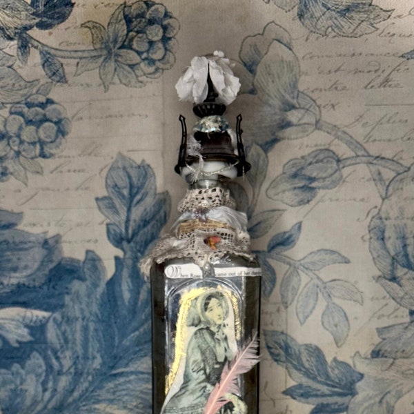 Tall Antique Bottle turned into Assemblage Art - "When Rose Came Out of Her Chamber"