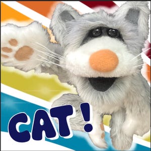 May include: A plush grey cat hand puppet with white fur accents on the face and paws, a round peach-colored nose, and black plastic eyes. The puppet has long white whiskers and is positioned with one paw raised. The word CAT! is printed in blue.