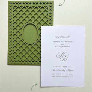 May include: A sage green laser-cut pocket jacket with a central oval window and a white 5" x 7" invitation card. The card features black text: You're invited to the wedding of Kaitlin Macdonald and David Johnson, with a KD monogram and date.
