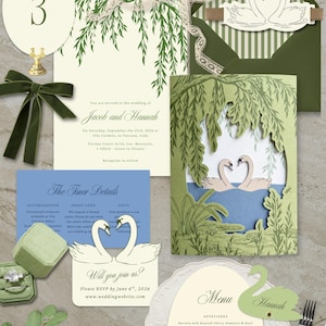 May include: Wedding stationery set with a swan design. Includes invitation cards, RSVP card, menu, and table number. The colour scheme is green, white, and blue. The invitation features a cut-out design of swans on a lake.