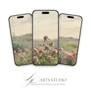 Könnte beinhalten: Drei Smartphones zeigen eine pastellfarbene Landschaft mit rosa Blumen. Die Telefone sind fächerförmig angeordnet, mit dem Text "ARTS STUDIO PHONE WALLPAPER COLLECTION" darunter. Das Bild strahlt Ruhe aus.