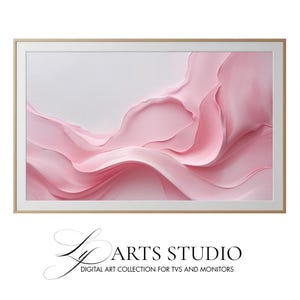 Puede incluir: Impresión digital enmarcada con un diseño abstracto en tonos rosa y blanco. La obra de arte tiene una apariencia texturizada, con líneas suaves y curvas. El marco es de color madera clara y el texto "Ly Arts Studio" está en la parte inferior.