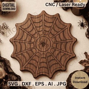 Puede incluir: Una pieza decorativa de madera con forma de telaraña con una araña en el centro. La pieza es marrón con líneas grabadas que forman el diseño de la telaraña. Se ven las palabras "DESCARGA DIGITAL" y "CNC / Laser Ready".