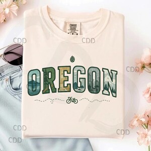 stato dell'Oregon png, pacifico nord-occidentale png, maglietta da ciclista di Portland png, arte del lago Crater png, escursionismo sul monte Hood png, stato della foresta png, arte murale del Pacifico nord-occidentale