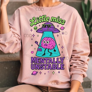 little miss mentally unstable png, alien brain png, funny mental health png, pastel emo png, retro cartoon png, ufo humor png, space tee art