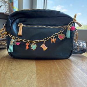 Pastelkleurige tasketting: Y2K-coquette-portemonneeaccessoire met hartjes en kwastjes