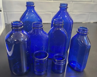 Lot of 8 Cobalt Blue Glass Bottles Vintage/ Antique