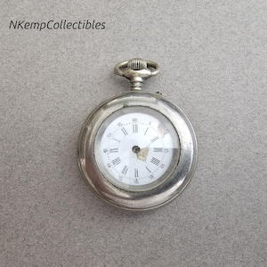 Antique metal pocket watch restoration project 1900