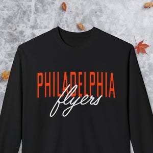Philadelphia Flyers Sweatshirt: Vintage Hockey Crewneck for Women