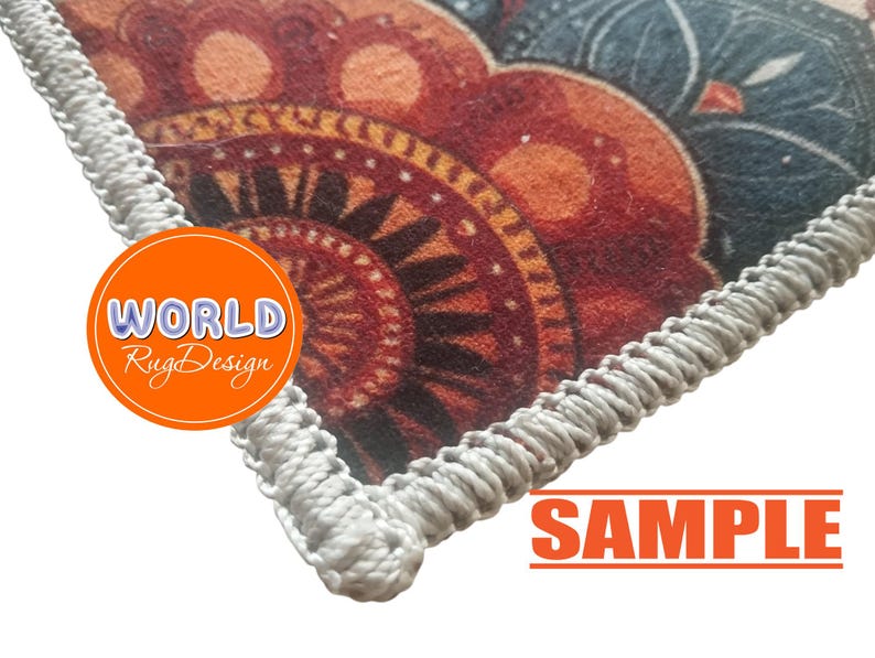 May include: Close-up of a rug corner with a detailed, colorful pattern in shades of red, orange, and blue. The rug has a white, braided border. The text "WORLD Rug Design" is in an orange circle, and the word "SAMPLE" is in the bottom right corner.