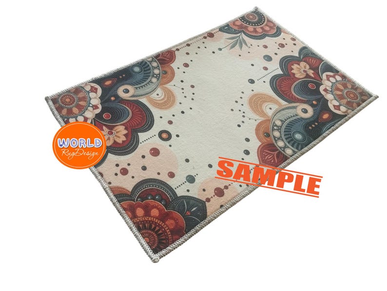 May include: A rectangular rug with a cream-colored background and a decorative floral pattern in shades of red, blue, and brown. The rug has a patterned border and the word "SAMPLE" is printed across the rug.