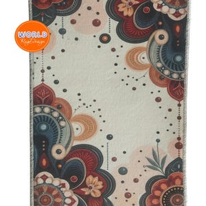 May include: Rectangular rug with a cream-colored background and a floral design in shades of red, blue, and tan. The rug features a decorative border and the text "SAMPLE" at the bottom. The rug also has the text "WORLD Rug Design" in a circle.