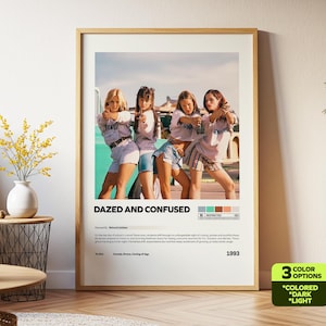May include: A framed poster featuring the movie "Dazed and Confused." The image shows four young people posing with their arms crossed. The poster has a light wood frame and includes the movie title, rating, and year of release.