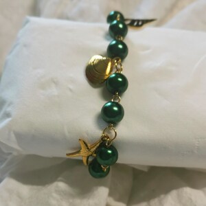 Handmade - Handcrafted Bracelet in Green Beads and Golden Stainless Steel Charms - Elegant & Minimalist Jewelry