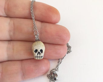 Tiny skull - ceramic pendant on stainless steel chain