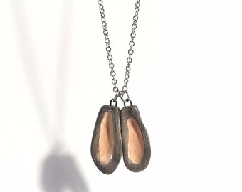 Bunny ears - ceramic pendants on stainless steel chain