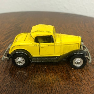 1934 Model A Ford toy Road Champs made by JRI Inc. in 1984 good condition opening doors and trunk