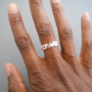 Innovation ring solid silver in capitals
