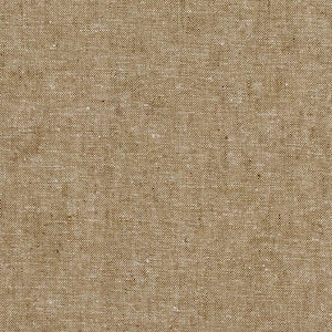 Könnte beinhalten: Nahaufnahme eines braunen Gewebes mit einer strukturierten Oberfläche.