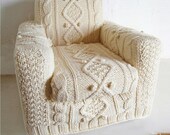 hand knitted cream aran armchair slip cover