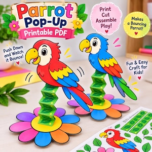Puede incluir: Una manualidad Parrot Pop-Up en PDF imprimible con dos loros de papel sobre tallos de hojas verdes plegados en acordeón unidos a bases de flores coloridas. Un loro es rojo, amarillo y azul; el otro es azul, amarillo y rojo. El texto incluye Parrot Pop-Up, Print Cut Assemble Play!, Makes a Bouncing Parrot!, Push Down and Watch it Bounce!, y Fun & Easy Craft for Kids!