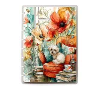 May include: A rectangular notebook cover featuring a watercolor illustration of a small white dog sitting on a vibrant orange armchair. The scene includes large orange and yellow flowers, stacks of books, a teacup, and a lantern in a soft, artistic style.