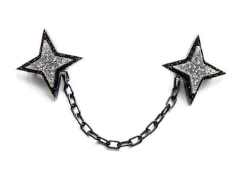 Presilha para suéter em estrela preta com glitter: proteção para cardigan rockabilly atômico