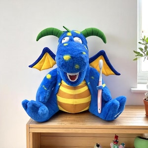 Peluche dentaire dinosaure - Poupée éducative avec modèle de dents et brosse à dents pour enfant, cadeau d'entraînement au brossage
