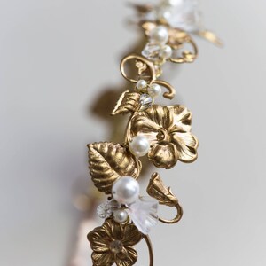Close-up of gold headband with pearl and crystal accents, Edwardian bridal hairpiece