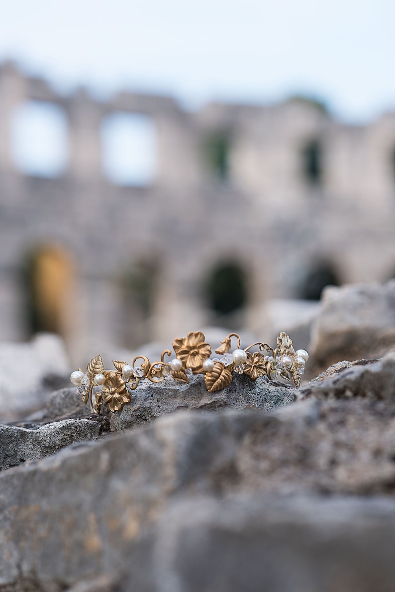 Edwardian inspired bridal headband photographed outdoors, brass flowers and pearl accents