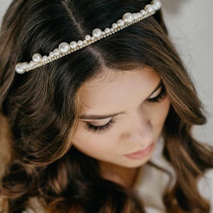 Scaloped pearl bridal tiara with crystal row.